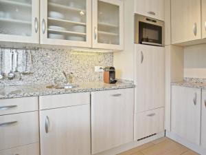 Kuchyň nebo kuchyňský kout v ubytování Apartment Auarara by Interhome