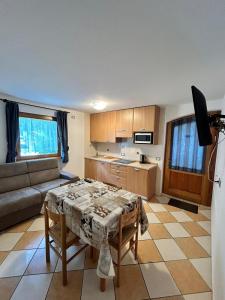 Kuchyň nebo kuchyňský kout v ubytování Appartamento Cima Cavalli