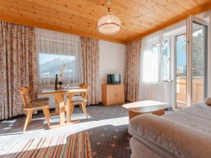 TV a/nebo společenská místnost v ubytování Apartment Mitterkopf by Interhome