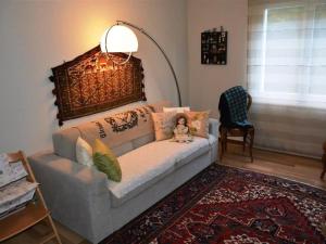 Posezení v ubytování Apartment Hübeli - Arm by Interhome