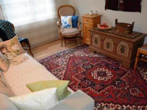 Posezení v ubytování Apartment Hübeli - Arm by Interhome
