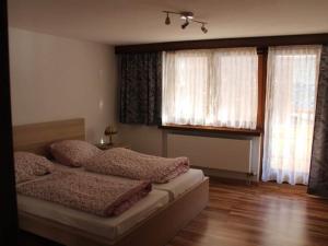 Postel nebo postele na pokoji v ubytování Apartment Silberdistel by Interhome + 15 fotografií