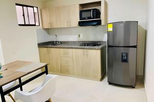 Kuchyň nebo kuchyňský kout v ubytování 9902Aparta estudio totalmente dotado WiFi200 megas + 11 fotografií