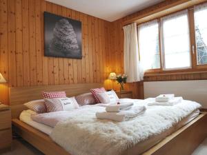 Giường trong phòng chung tại Apartment Halten by Interhome