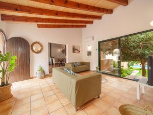 Posezení v ubytování Holiday Home Sa Taulera by Interhome + 21 fotografií