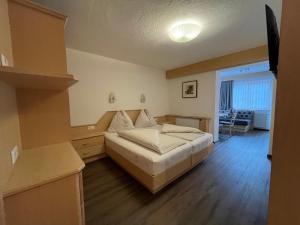 Łóżko lub łóżka w pokoju w obiekcie Franzele Appartements & Breakfast