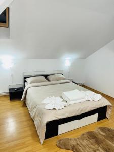 Un pat sau paturi într-o cameră la Casa Montana