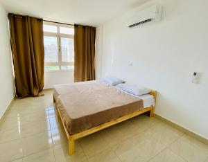 Ένα ή περισσότερα κρεβάτια σε δωμάτιο στο Elegant Home with Free WiFi in Madinaty