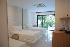 Letto o letti in una camera di Ton Sai Tropical Phi Phi Island