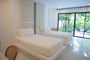 Letto o letti in una camera di Ton Sai Tropical Phi Phi Island