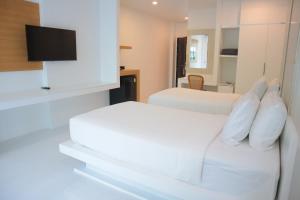 Letto o letti in una camera di Ton Sai Tropical Phi Phi Island