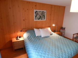 Postel nebo postele na pokoji v ubytování Apartment Hübeli - Chapman by Interhome