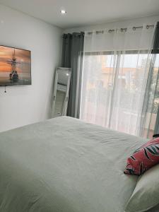 Uma cama ou camas num quarto em The Green House