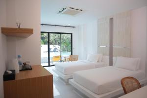 Letto o letti in una camera di Ton Sai Tropical Phi Phi Island