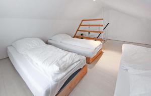 Postel nebo postele na pokoji v ubytování Ferienhaus Gahlkow