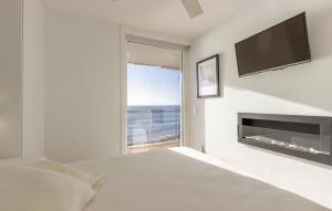 Ένα ή περισσότερα κρεβάτια σε δωμάτιο στο Lovely Apartment In Teulada