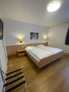 Postel nebo postele na pokoji v ubytování Gasthaus Sonnen