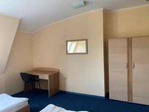 Postel nebo postele na pokoji v ubytování Budget Hotel Ekotel