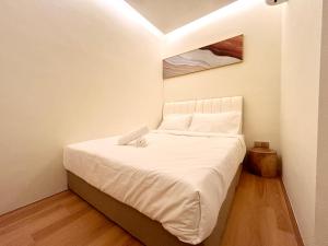 Postel nebo postele na pokoji v ubytování ONE18 Boutique Hotel