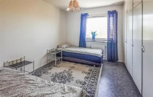 Ένα ή περισσότερα κρεβάτια σε δωμάτιο στο 3 Bedroom Cozy Apartment In Visby +2 φωτογραφίες