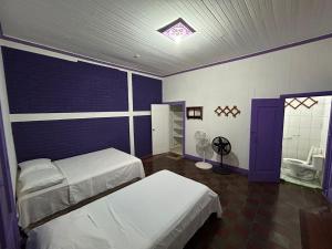 Cama o camas de una habitación en Casa Romano Hostel