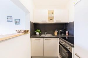 Η κουζίνα ή μικρή κουζίνα στο Wildgrün Panorama Lodge 5