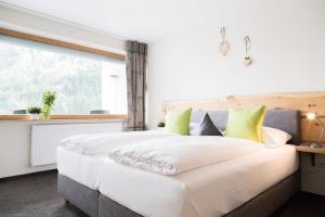 Ένα ή περισσότερα κρεβάτια σε δωμάτιο στο Wildgrün Panorama Lodge 5