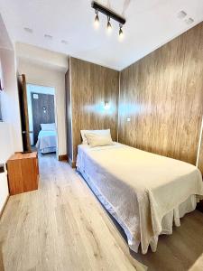 Postel nebo postele na pokoji v ubytování Hostal Recreo