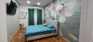 Postel nebo postele na pokoji v ubytování Venera Lux Apartman