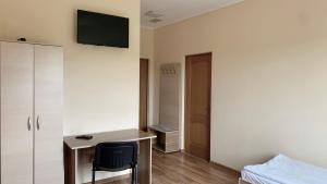 TV a/nebo společenská místnost v ubytování Budget Hotel Ekotel