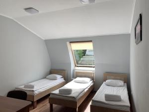 Postel nebo postele na pokoji v ubytování Budget Hotel Ekotel