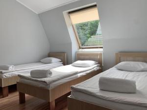 Postel nebo postele na pokoji v ubytování Budget Hotel Ekotel