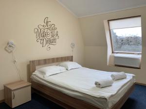 Postel nebo postele na pokoji v ubytování Budget Hotel Ekotel