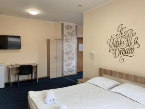 Postel nebo postele na pokoji v ubytování Budget Hotel Ekotel