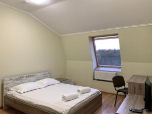 Postel nebo postele na pokoji v ubytování Budget Hotel Ekotel
