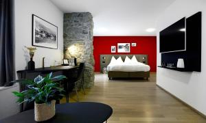 Ένα ή περισσότερα κρεβάτια σε δωμάτιο στο Hotel Zugertor