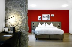 Ένα ή περισσότερα κρεβάτια σε δωμάτιο στο Hotel Zugertor