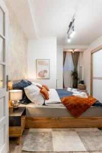 a bedroom with a large bed in a room at Garbo 3 bedroom Kosice Centrum Very NEW in Košice