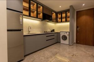 Kuchyň nebo kuchyňský kout v ubytování Seashell Apartments
