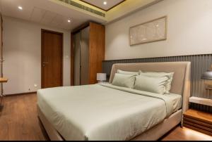Postel nebo postele na pokoji v ubytování Seashell Apartments