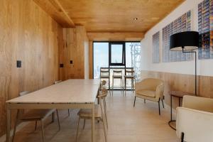 a dining room with a table and chairs at Casa Colon in Mexico City