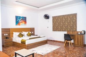 Kama o mga kama sa kuwarto sa Ringruby Hotel, Sangotedo