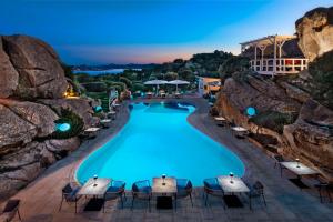 a view of a pool at a resort at Grand Hotel Resort&SPA Ma&Ma - Adults Only in La Maddalena