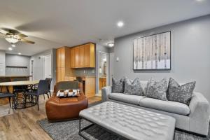 a living room with a couch and a table at Silvertown Condos by Park City Vacations in Park City
