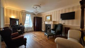 A television and/or entertainment centre at Sweeney's Hotel 2020 Limited