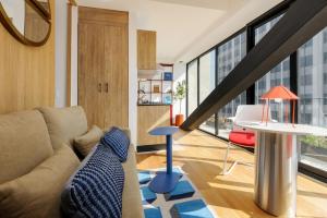 a living room with a couch and a table at Casa Colon in Mexico City +39 photos