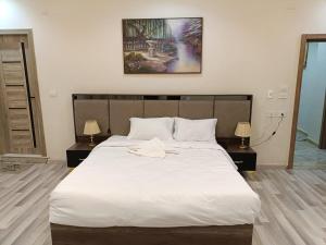 Voodi või voodid majutusasutuse Maktub Pyramids Hotel toas