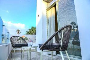 Rõdu või terrass majutusasutuses Maktub Pyramids Hotel