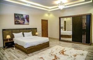 Voodi või voodid majutusasutuse Maktub Pyramids Hotel toas