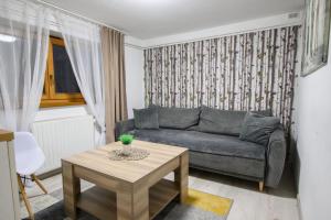 Posedenie v ubytovaní APARTAMENT TAJEMNICZY OGRÓD ŚCISŁE CENTRUM ZAKOPANE